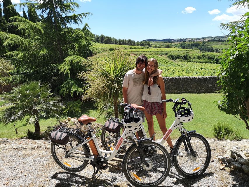 Barcelona: Bike & Wine Guided Tour - Penedès vineyards - Getting fitted for a bike at Lavern-Subirats