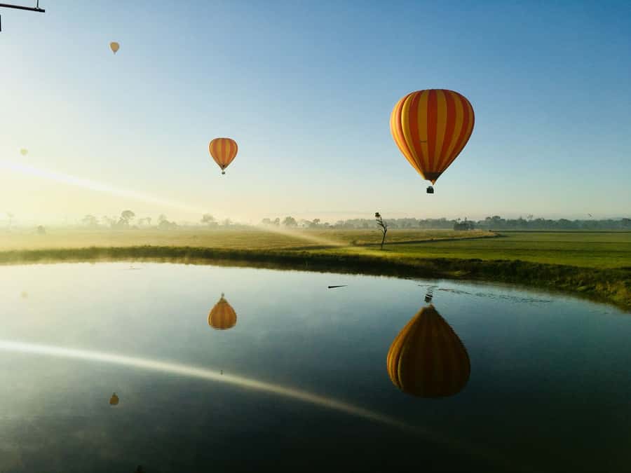 Brisbane: Hot Air Balloon Flight with Vineyard Breakfast - Watching a ten-storey balloon come alive