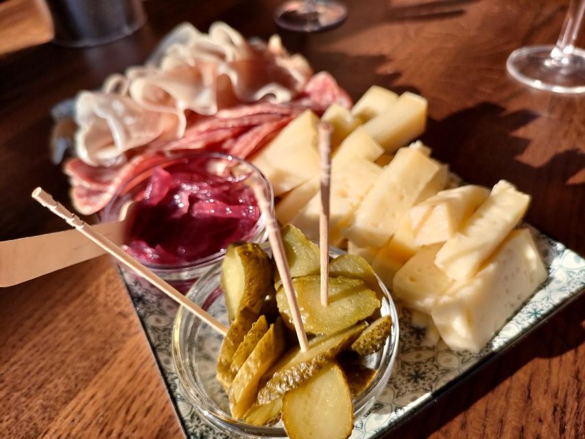 Cavaion: Lake Garda Wine & Food Tasting with Vineyard Tour - The food board is more generous than a token snack