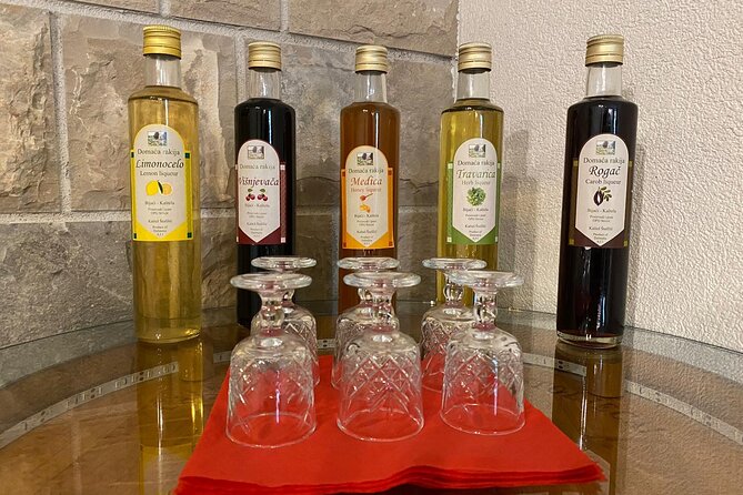 Family-run Vineyard Tour & Award Winning Wine Tasting/Delicacies - A Dalmatian table in the olive grove