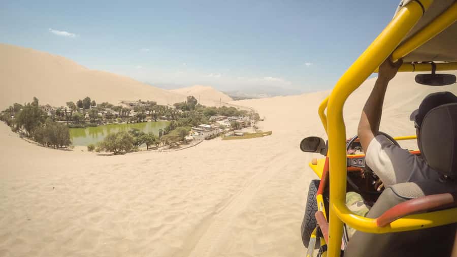 From Lima: Ballestas Islands, Huacachina and Wine Route Trip - Huacachina’s oasis and desert dunes
