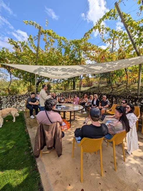 From Porto: 2 Wine Regions, Farm-to-Table Lunch & Boat - The Vintage Port bottle opened with fire
