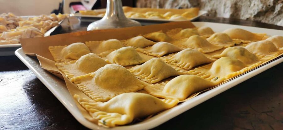 From Rome: Pasta Masterclass & Wine Tour in the Vineyard - Rolling pasta with an Italian chef