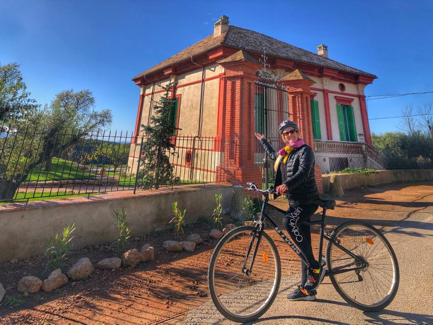 From Sitges: Paella Masterclass, Bike Ride and Winery Visit - Cooking paella with a family recipe