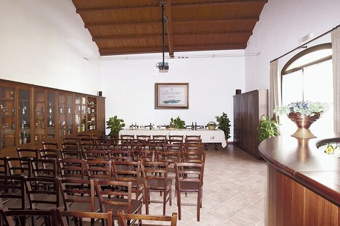 Historic winery visit with food and wine tasting in Marsala - Almond cakes, cheeses, and local bread