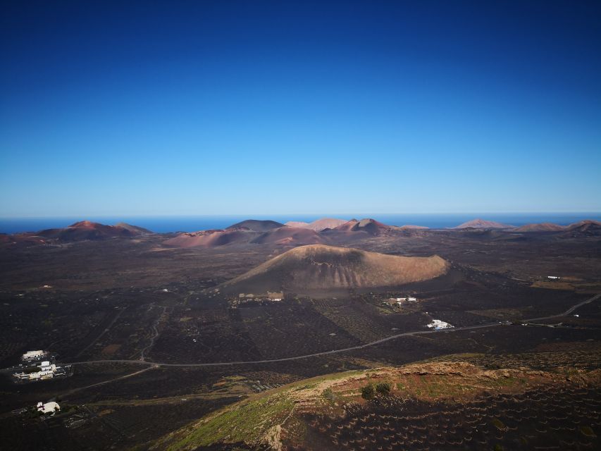 Lanzarote: La Geria Vineyards Hiking Tour - Walking through the volcanic vineyards