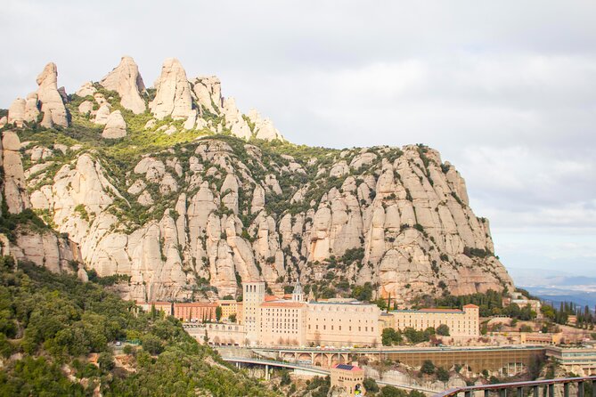 Montserrat Full Day Tour with Farmhouse Lunch and Winery Visit - The cogwheel train adds more than transport