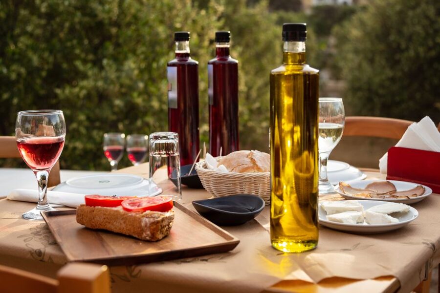 Mykonos: Winery Vineyard Experience with Food & Wine Tasting - From grape to bottle, with olive oil in the picture