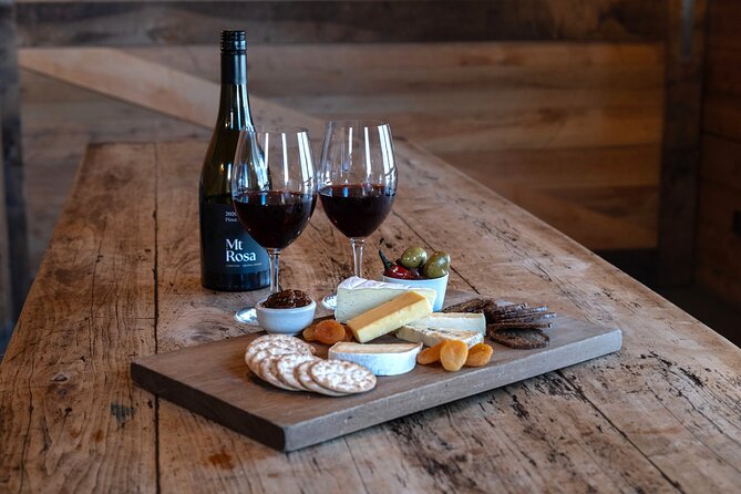 Queenstown Classic Wine Tour: 3 Winery Visits, Cave Tour & Cheese - What the guide adds to the experience